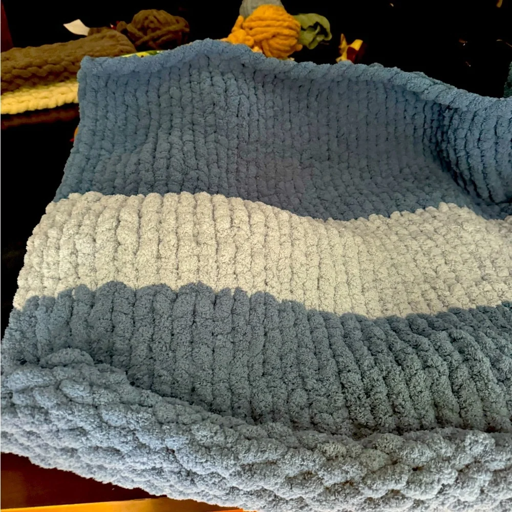 Hand knitting blankets , baby blanket’s dog beds , Cat beds and more